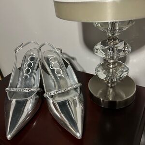 SUGAR Silver and diamond metallic slingback shoes.